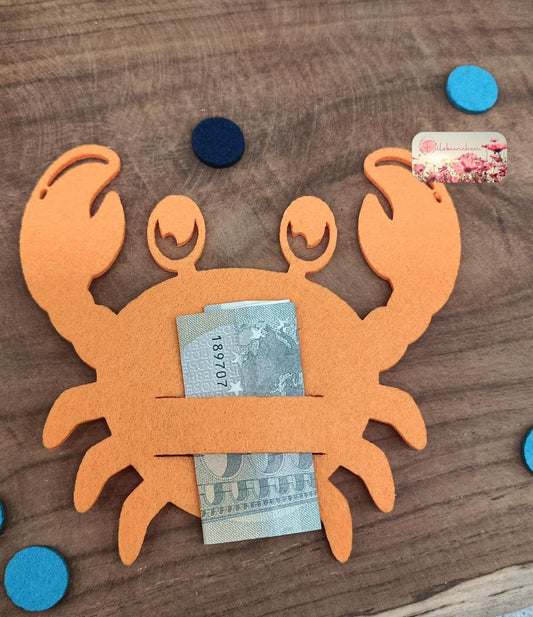 Krebs mit Schlitz Geld